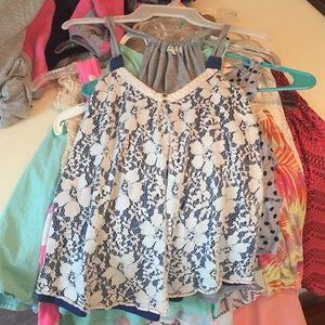 White lace tank top with navy under it